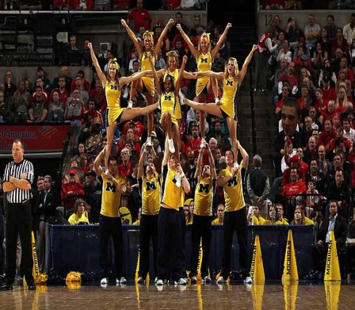 INDIANAPOLIS, IN - MARCH 10: Cheerleaders for the Michigan Wolverines perform against the Ohio State Buckeyes during their Semifinal game of the 2012 Big Ten Men's Basketball Conference Tournament at Bankers Life Fieldhouse on March 10, 2012 in Indianapolis, Indiana. (Photo by Jonathan Daniel/Getty Images)