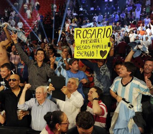 LAS VEGAS, NV - SEPTEMBER 15: Fans celebrate after Julio Cesar Chavez Jr. is defeated by Sergio Martinez for their WBC middleweight title fight at the Thomas & Mack Center on September 15, 2012 in Las Vegas, Nevada. (Photo by Jeff Bottari/Getty Images)