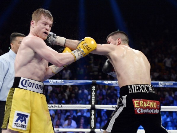 Canelo y Angulo en el ring.