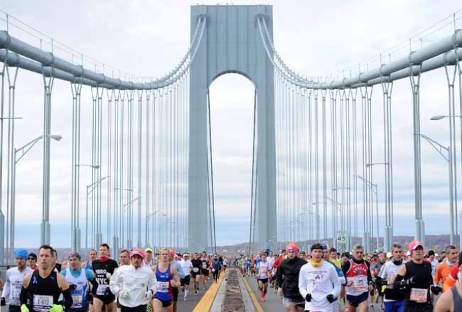 NEW YORK, NY - NOVEMBER 03: Runners cross the Verrazano-Narrows Bridge at the start of the ING New York City Marathon on November 3, 2013 in the Brooklyn borough of New York City. (Photo by Maddie Meyer/Getty Images)