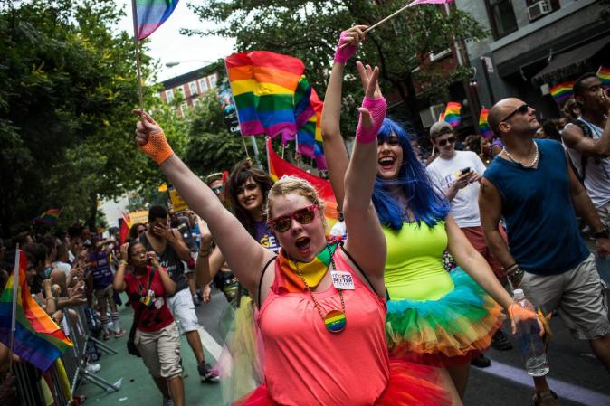 NEW YORK, NY - JUNE 30: Revelers march in the New York Gay Pride Parade on June 30, 2013 in New York City. This year's parade was a particularly festive occasion, due to the recent Supreme Court Ruling that it was unconstitutional to ban gay marriage. (Photo by Andrew Burton/Getty Images)