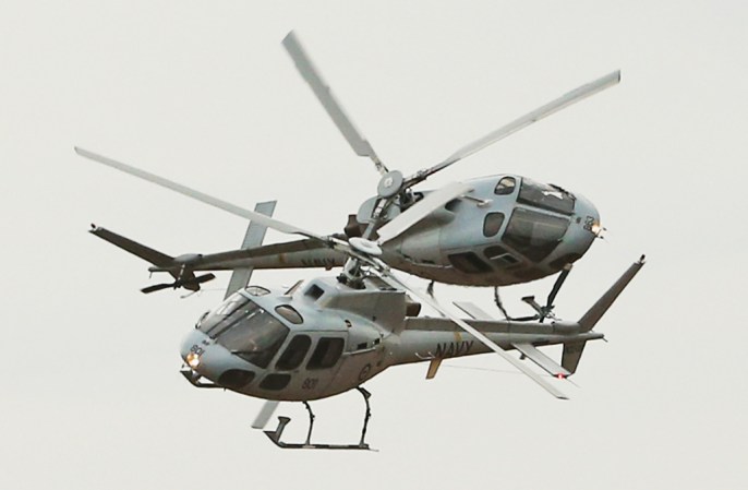 AVALON, AUSTRALIA: Dos helicopteros AS350 Squirrel durante el Australian International Airshow.