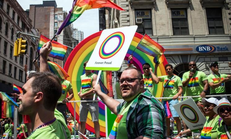 NEW YORK, NY - JUNE 30: Revelers march in the New York Gay Pride Parade on June 30, 2013 in New York City. This year's parade was a particularly festive occasion, due to the recent Supreme Court Ruling that it was unconstitutional to ban gay marriage. (Photo by Andrew Burton/Getty Images)