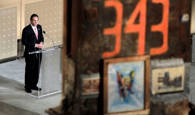 NEW YORK, NY - MAY 15: New York Governor Andrew M. Cuomo speaks during the opening ceremony for the National September 11 Memorial Museum at ground zero May 15, 2014 in New York City. The museum spans seven stories, mostly underground, and contains artifacts from the attack on the World Trade Center Towers on September 11, 2001 that include the 80 ft high tridents, the so-called "Ground Zero Cross," the destroyed remains of Company 21's New York Fire Department Engine as well as smaller items such as letter that fell from a hijacked plane and posters of missing loved ones projected onto the wall of the museum. The museum will open to the public on May 21. (Photo by John Angelillo-Pool/Getty Images)