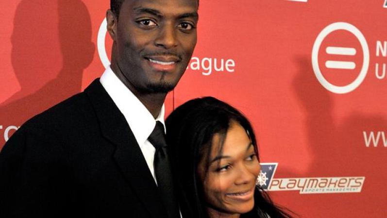 El jugador de fútbol americano Plaxico Burress y su esposa Tiffany.