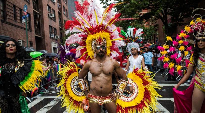NEW YORK, NY - JUNE 30: Revelers march in the New York Gay Pride Parade on June 30, 2013 in New York City. This year's parade was a particularly festive occasion, due to the recent Supreme Court Ruling that it was unconstitutional to ban gay marriage. (Photo by Andrew Burton/Getty Images)