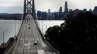 Light traffic crosses the San Francisco – Oakland Bay Bridge.
