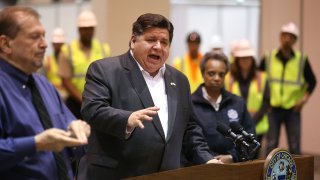 Illinois Gov. J.B. Pritzker speaks during a news conference in Hall C Unit 1 of the COVID-19 alternate site at McCormick Place in Chicago on Friday, April 3, 2020. Hall C will house 500 beds.