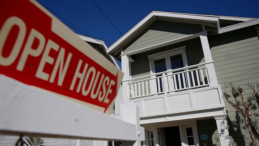 File Image: Open House signage is displayed outside of a home for sale in Redondo Beach, California, U.S., on Saturday, Feb. 14, 2015.