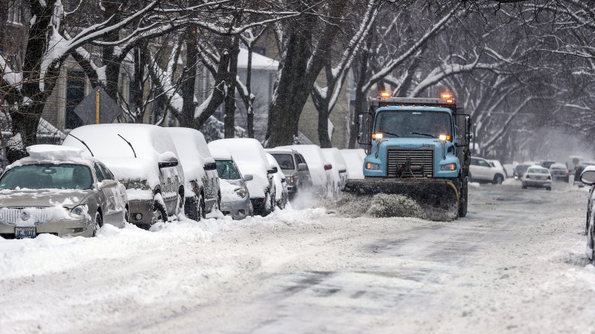 CHICAGO, USA – FEBRUARY 09: A snow plow truck clears snow on the road after the blizzard in Chicago, Illinois, United States on February 09, 2018. (Photo by Bilgin S. Sasmaz/Anadolu Agency/Getty Images)