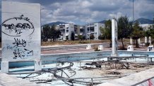 ATHENS, GREECE - JULY 31: General view of the former Olympic Village in Athens, Greece on July 31, 2014. Ten years ago the XXVIII Olympiad was held in Athens from the 13th - 29th August with the motto "Welcome Home". The cost of hosting the games was estimated to be approx 9 billion euros with the majority of sporting venues built specifically for the games. Due to Greece's economic frailties post Olympic Games there has been no further investment and the majority of the newly constructed stadiums now lie abandoned. (Photo by Milos Bicanski/Getty Images)