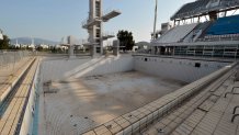 ATHENS, GREECE - JULY 31: General view of the Olympic Aquatic Center in Athens, Greece on July 31, 2014. Ten years ago the XXVIII Olympiad was held in Athens from the 13th - 29th August with the motto "Welcome Home". The cost of hosting the games was estimated to be approx 9 billion euros with the majority of sporting venues built specifically for the games. Due to Greece's economic frailties post Olympic Games there has been no further investment and the majority of the newly constructed stadiums now lie abandoned. (Photo by Milos Bicanski/Getty Images)