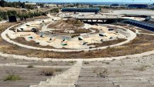 ATHENS, GREECE - JULY 31: General view of the Olympic Canoe/Kayak Slalom Center at the Helliniko Olympic complex in Athens, Greece on July 31, 2014. Ten years ago the XXVIII Olympiad was held in Athens from the 13th - 29th August with the motto "Welcome Home". The cost of hosting the games was estimated to be approx 9 billion euros with the majority of sporting venues built specifically for the games. Due to Greece's economic frailties post Olympic Games there has been no further investment and the majority of the newly constructed stadiums now lie abandoned. (Photo by Milos Bicanski/Getty Images)