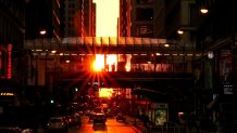 CHICAGO, USA - SEPTEMBER 22: A view of the Chicago's western streets Kinzie and Madison as the sun rises and falls straight down one of two days a year which is known as "Chicagohenge" in Chicago, United States on September 22, 2017. (Photo by Bilgin S. Sasmaz/Anadolu Agency/Getty Images)