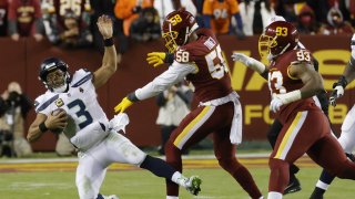 Seattle Seahawks quarterback Russell Wilson (3) is sacked by Washington Football Team defensive end Shaka Toney (58) during the fourth quarter at FedExField.
