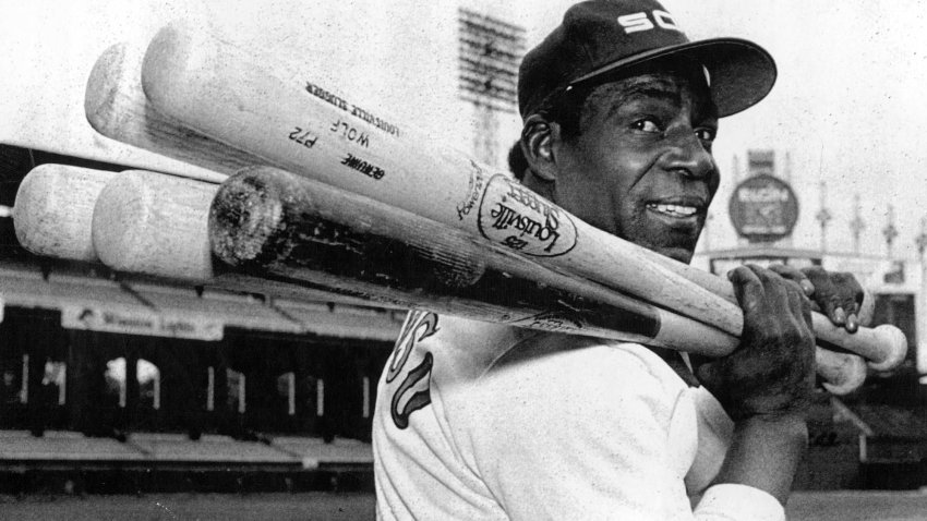 Minnie MiÃ±oso holds five bats to indicate five decades after he was activated by the White Sox for their weekend series against the California Angels on Oct. 3, 1980. (Chicago Tribune historical photo/Tribune News Service via Getty Images)