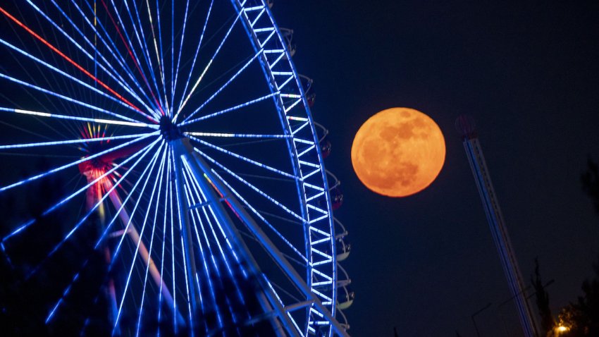 Full moon, known as the Strawberry moon rises over the sky in Antalya, Turkey on June 15, 2022.
