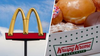 A McDonalds sign and box of Krispy Kreme donuts