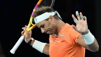 Rafael Nadal of Spain reacts in their round two singles match against Mackenzie McDonald of the United States during day three of the 2023 Australian Open at Melbourne Park on January 18, 2023 in Melbourne, Australia.