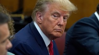 NEW YORK, NY - APRIL 04: Former U.S. President Donald Trump sits with his attorneys inside the courtroom during his arraignment at the Manhattan Criminal Court April 4, 2023 in New York City.