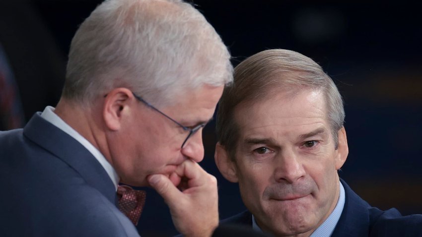 U.S. Rep. Jim Jordan (R-OH) (R) talks to Speaker Pro Tempore Rep. Patrick McHenry (R-NC) as the House of Representatives prepares to hold a vote on a new Speaker of the House at the U.S. Capitol on October 18, 2023 in Washington, DC.