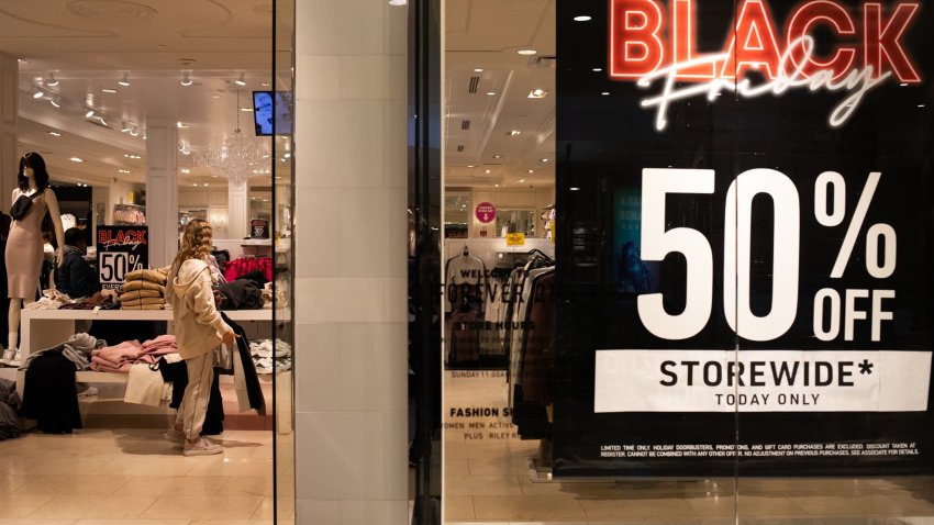 A shopper looks at clothes inside a store at Twelve Oaks Mall on November 24, 2023 in Novi, Michigan. 