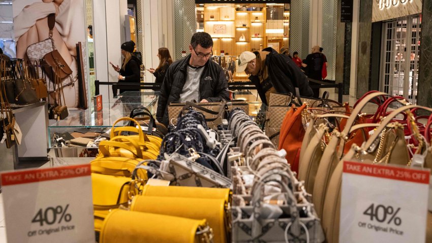 People shop at Macy’s on “Black Friday” in New York City on November 24, 2023. The retail sector’s efforts to entice holiday gift purchases builds to a crescendo this weekend with the annual “Black Friday” shopping day followed by the newer “Cyber Monday.” (Photo by Yuki IWAMURA / AFP) (Photo by YUKI IWAMURA/AFP via Getty Images)