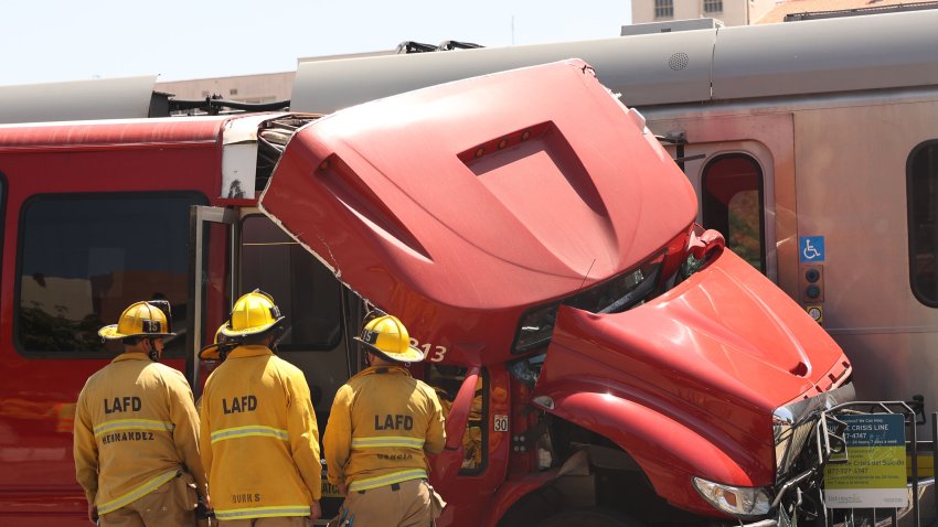 Los Angeles, CA – April 30: The side view of the aftermath of the collision between a Metro train and USC bus on the 900 block of West Exposition Boulevard in the Exposition Park area on Tuesday, April 30, 2024 in Los Angeles, CA. (Michael Blackshire / Los Angeles Times via Getty Images)