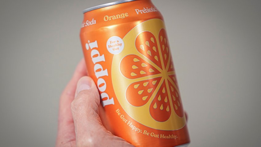 FILE – A can of Poppi prebiotic soda is shown on April 10, 2024, in New York. Soda brand Poppi is being sued by a consumer who says the brand isn’t improving gut health as much as it claims.