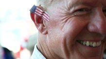 MILWAUKEE, WISCONSIN - JULY 15: A person has a American flag bandaid on his ear on the first day of the Republican National Convention at the Fiserv Forum on July 15, 2024 in Milwaukee, Wisconsin. Delegates, politicians, and the Republican faithful are in Milwaukee for the annual convention, concluding with former President Donald Trump accepting his party's presidential nomination. The RNC takes place from July 15-18. (Photo by Leon Neal/Getty Images)