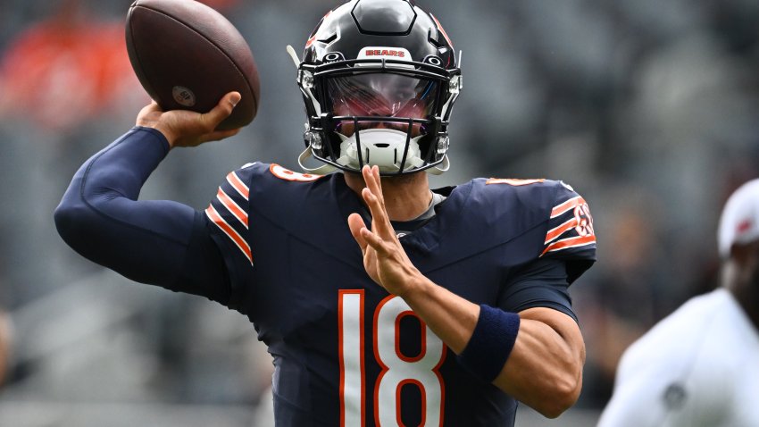 CHICAGO, ILLINOIS – AUGUST 17: Caleb Williams #18 of the Chicago Bears warms up before a preseason game against the Cincinnati Bengals at Soldier Field on August 17, 2024 in Chicago, Illinois. (Photo by Quinn Harris/Getty Images)