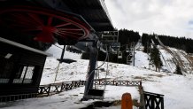 A ski-jumping venue lies abandoned on Mount Igman, near Sarajevo, on February 7, 2024, as Sarajevo begins marking the 40th anniversary of the XIV Winter Olympics. Two ski jumping ramps (80 meters and 120 meters) were built 40 years ago as one of the Olympic venues during Sarajevo's XIV Winter Olympics in 1984. The venue has never been used for competition since. Four decades after Bosnia's capital Sarajevo hosted the Winter Olympics, residents remember the event with a mixture of pride and melancholy that marked one of the last unifying moments in Yugoslavia before war destroyed the country. Most of the Olympics infrastructure was destroyed during the war that raged from 1992 to 1995, with Bosnia Serb political leaders and fighters commandeering a hotel during the siege of Sarajevo that once hosted tourists at the games. The stunning reversal of the city's fortunes remains a bittersweet wound for residents with living memories of both the Olympics and the war that followed. (Photo by ELVIS BARUKCIC / AFP) (Photo by ELVIS BARUKCIC/AFP via Getty Images)