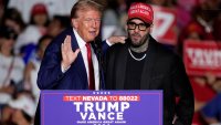 Republican presidential nominee former President Donald Trump, left, greets Nicky Jam during a campaign event at the World Market Center, Friday, Sept.13, 2024, in Las Vegas. (AP Photo/John Locher)