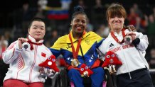 PARIS, FRANCE - SEPTEMBER 05: (L-R) Silver medalist, Jinping Xiao of Team People’s Republic of China, gold medalist, Clara Sarahy Fuentes Monasterio of Team Venezuela, and bronze medalist, Olivia Broome of Team Great Britain, pose for a photo during the medal ceremony for the Women's up to 50KG Final on day eight of the Paris 2024 Summer Paralympic Games at Porte de La Chapelle Arena on September 05, 2024 in Paris, France. (Photo by David Ramos/Getty Images)