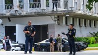 Department of Homeland Security police officers and other law enforcement officials stand watch outside the Paul G. Rogers Federal Building and US Courthouse during a hearing on the detention of Ryan Wesley Routh, suspected of the attempted assassination of former US president Donald Trump, in West Palm Beach, Florida, on September 23, 2024. Routh was detained after fleeing Trump’s club in West Palm Beach where the former president was playing golf on September 15 when Secret Service agents discovered a rifle barrel sticking out from a treeline and opened fire on the suspect. (Photo by Giorgio VIERA / AFP) (Photo by GIORGIO VIERA/AFP via Getty Images)