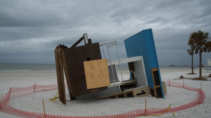 A collapsed lifeguard tower as a result of Hurricane Helene is seen in Clearwater, Florida ahead of Hurricane Milton’s expected mid-week landfall, on October 6, 2024. Another potentially devastating storm barreled toward the Florida coast on October 6, as the head of the US disaster relief agency lashed out at a “dangerous” misinformation war being waged over the aftermath of Hurricane Helene.
The National Hurricane Center (NHC) said the new storm, Milton, had intensified into a Category 1 hurricane Sunday with maximum sustained winds of 80 miles (130 kilometers) an hour. (Photo by Bryan R. SMITH / AFP) (Photo by BRYAN R. SMITH/AFP via Getty Images)