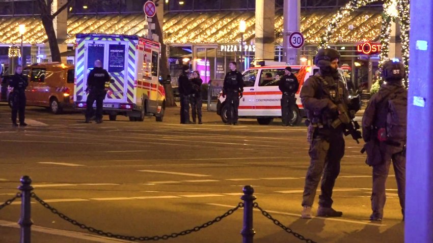 Police and ambulances stand next to the Christmas market, where a car crashed into a crowd injuring between “60 and 80 people”, according to a spokesman for the local rescue service, on December 20, 2024 in Magdeburg, eastern Germany. According to the emergency service, several people were “severely” injured”, the spokesman said. German media reported one person had died, although that was not yet confirmed by authorities. (Photo by NEWS5 / NEWS5 / AFP) (Photo by NEWS5/NEWS5/AFP via Getty Images)