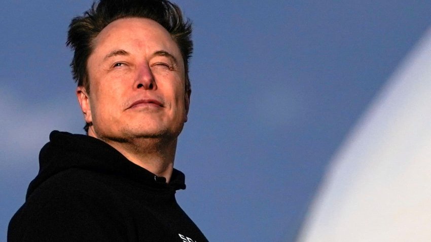 Tesla CEO Elon Musk boards Air Force One with U.S. President Donald Trump (not pictured) as they departs for Philadelphia, Pennsylvania, from Morristown Municipal Airport in Morristown, New Jersey, U.S., March 22, 2025. 