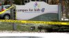 Padre de joven que mató a dos personas en una escuela religiosa en Wisconsin enfrenta cargos