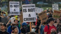 LOS ANGELES, CALIFORNIA – JUNE 11: Protesters continue to march and chant in an approximately one-square mile area of downtown Los Angeles in response to a series of immigration raids, on June 11, 2025 in Los Angeles, California. Protests escalated after President Donald Trump authorized military forces to protect federal property against the wishes of city and state officials who say that the Los Angeles police have the expertise and decades of experience to handle large protest crowds. National Guard troops have so far played no role in quelling violence in the streets, according to Mayor Bass, but are stationed to guard federal buildings.  (Photo by David McNew/Getty Images)