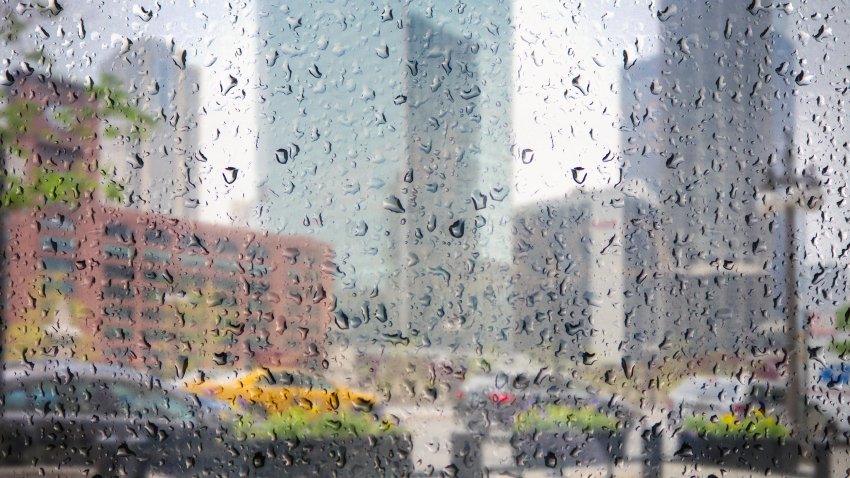 View on Chicago downtown through the window of cafe with rain drops. Chicago downtown and skyscrapers, Illinois, USA