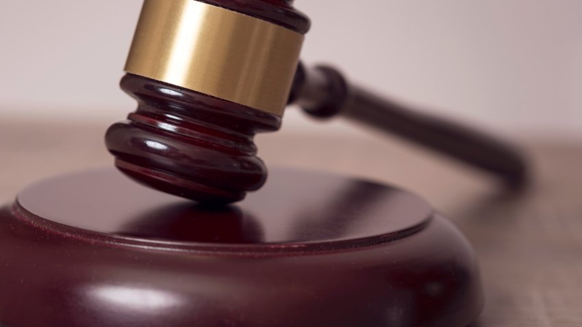 Close up of a judge gavel in a courtroom. Selective focus